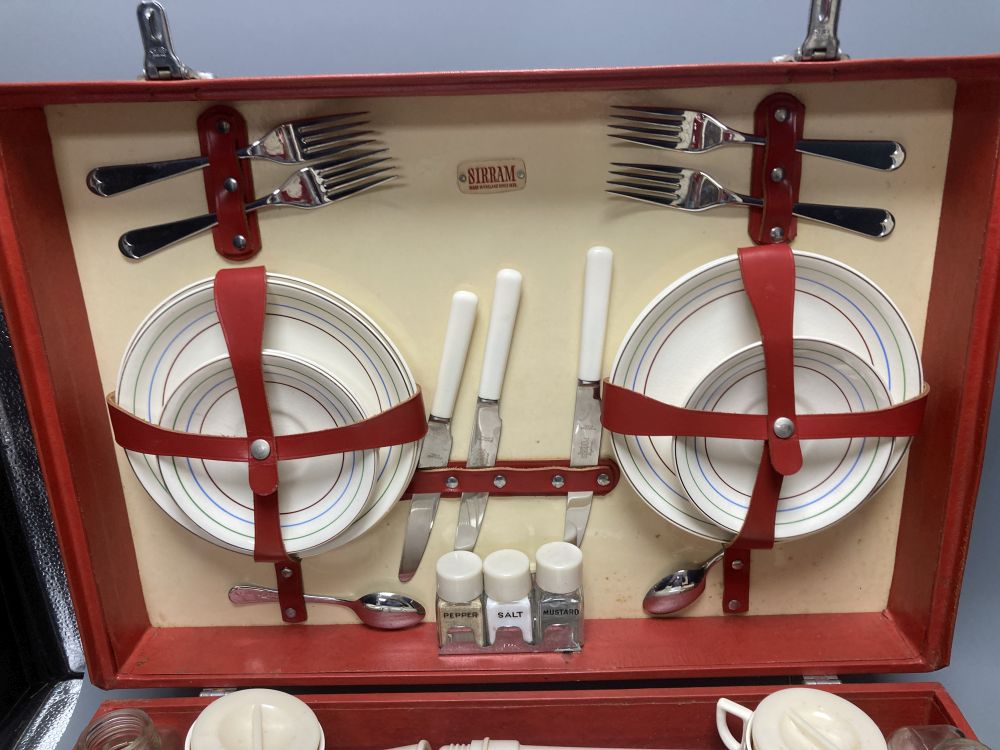 A 1960s Sirram picnic hamper set, in red vinyl case